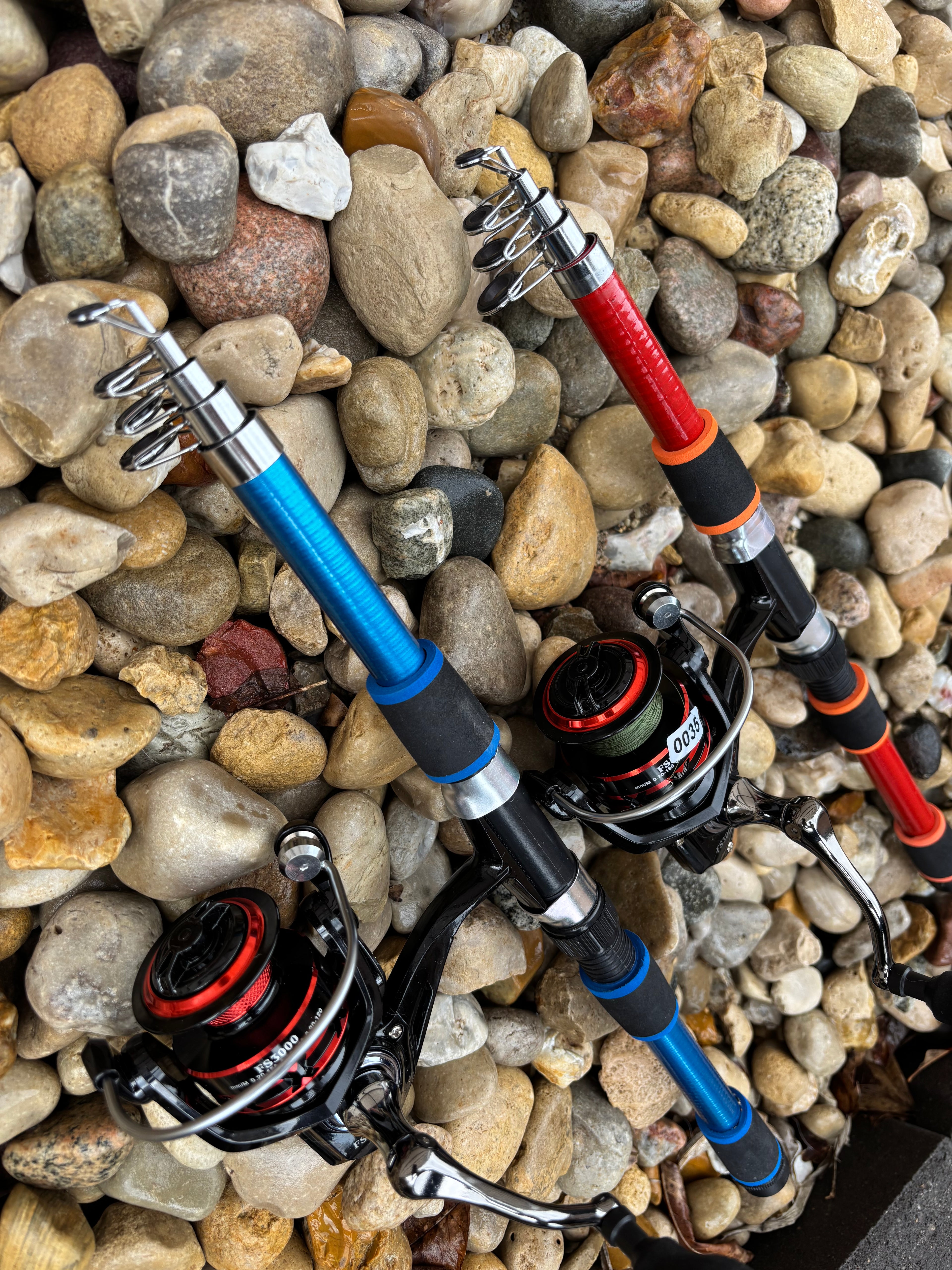 Blue and red fishing pole set
