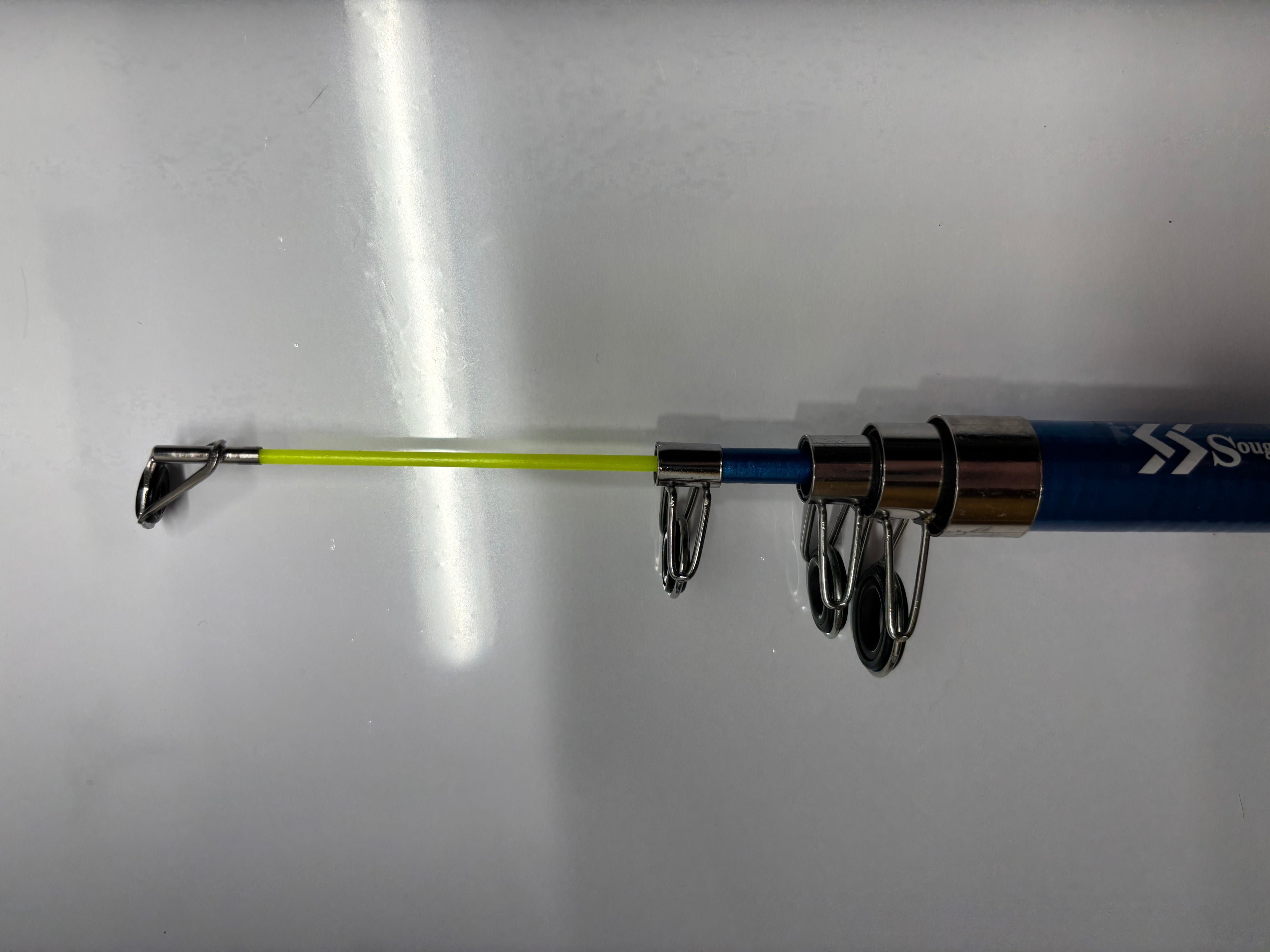 Green fishing pole telescoping easy storage